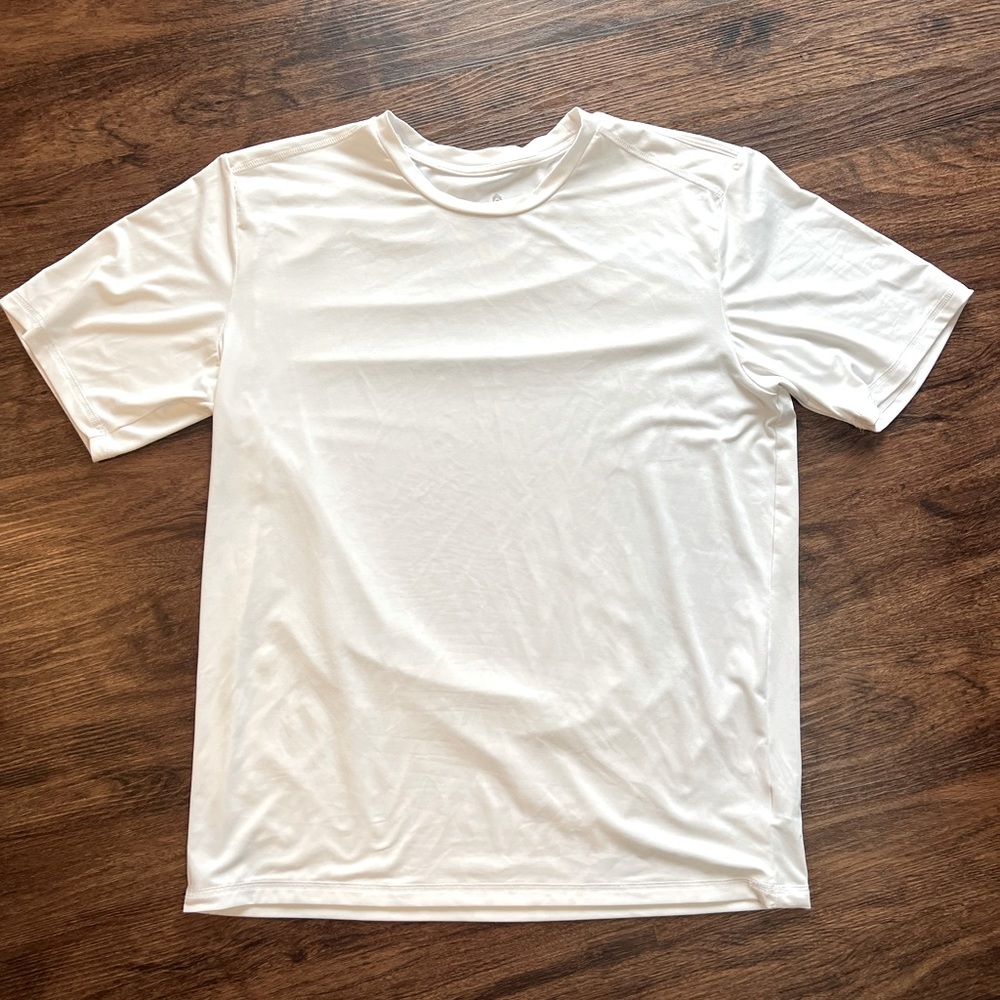 Stretchy white work out T-shirt, sweat wicking, fits like a medium